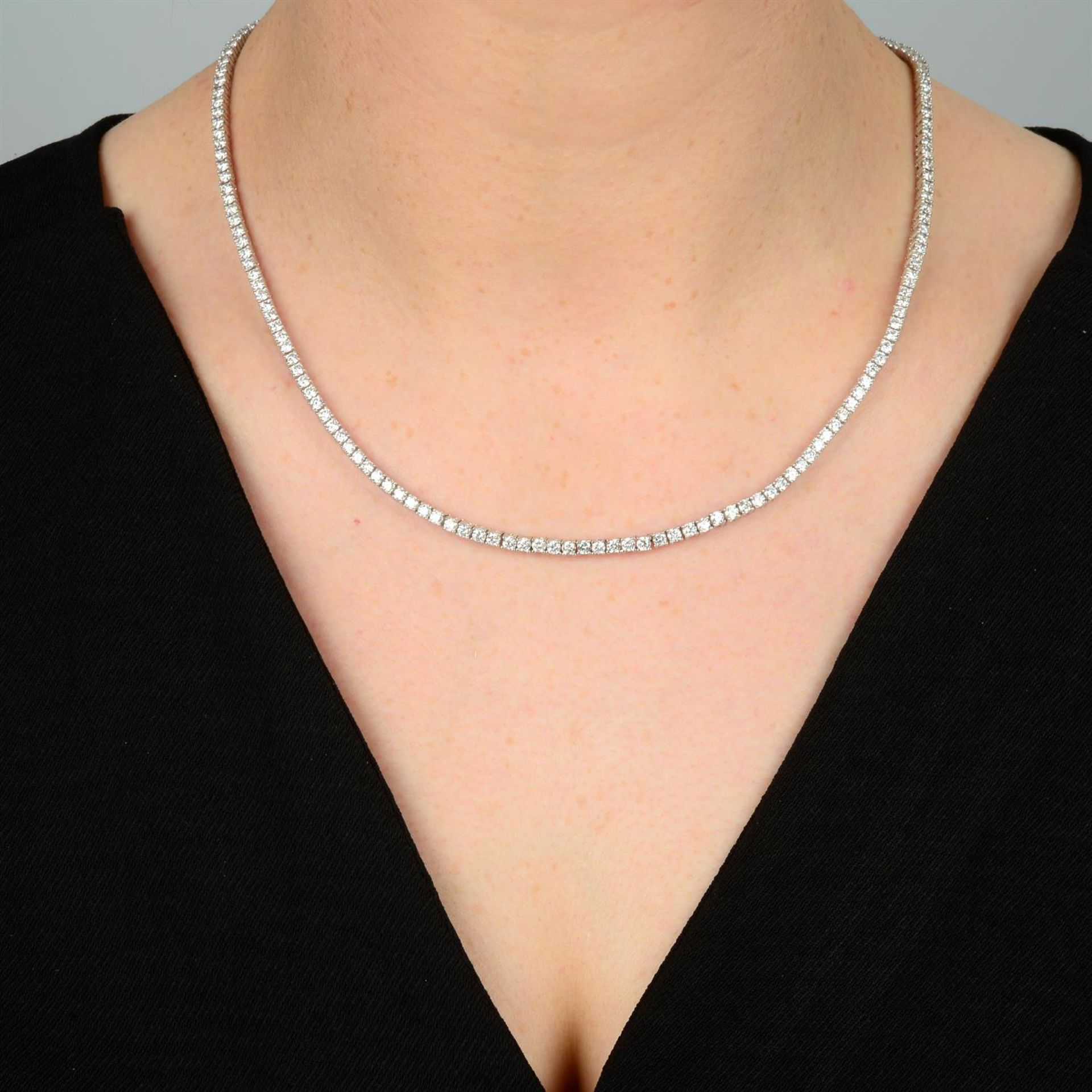 A brilliant-cut diamond line necklace. - Image 5 of 5
