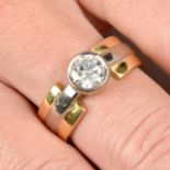 A bi-colour 18ct gold brilliant-cut diamond single-stone ring.