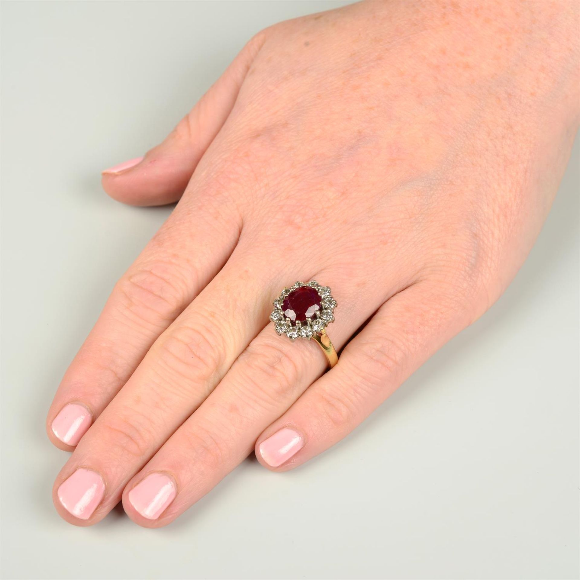 An 18ct gold ruby and brilliant-cut diamond cluster ring. - Image 5 of 5