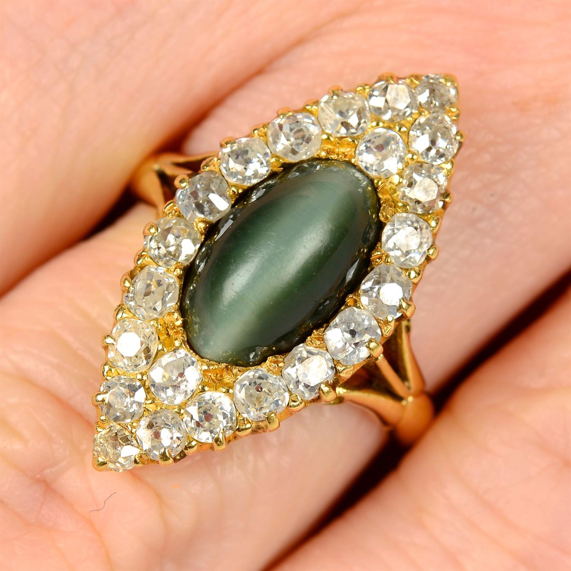 A late Victorian 18ct gold cat's-eye chrysoberyl and diamond ring.