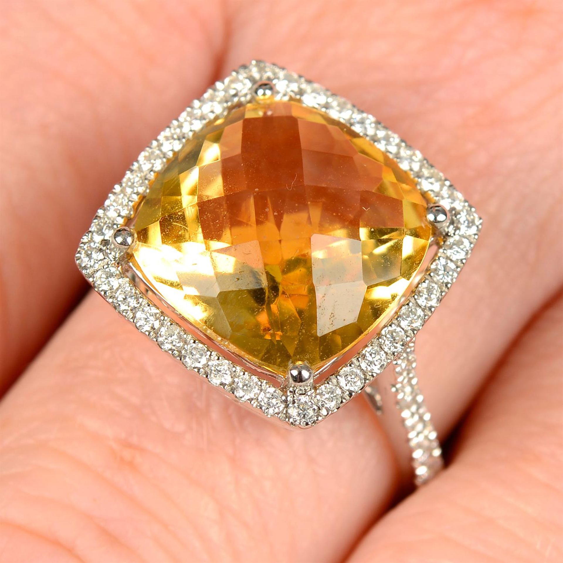 An 18ct gold citrine and brilliant-cut diamond dress ring.