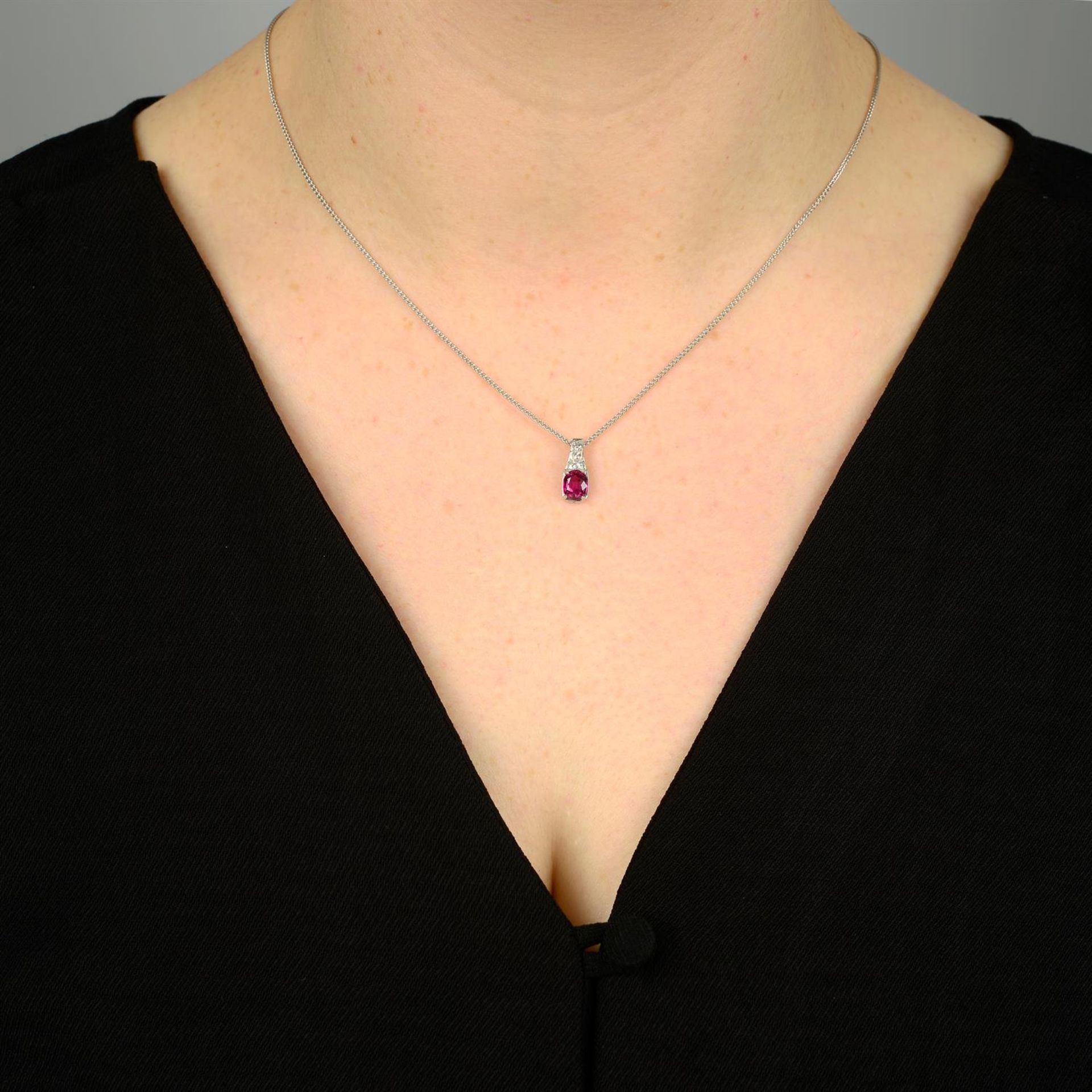 A ruby and diamond pendant, with 18ct gold chain. - Image 5 of 5