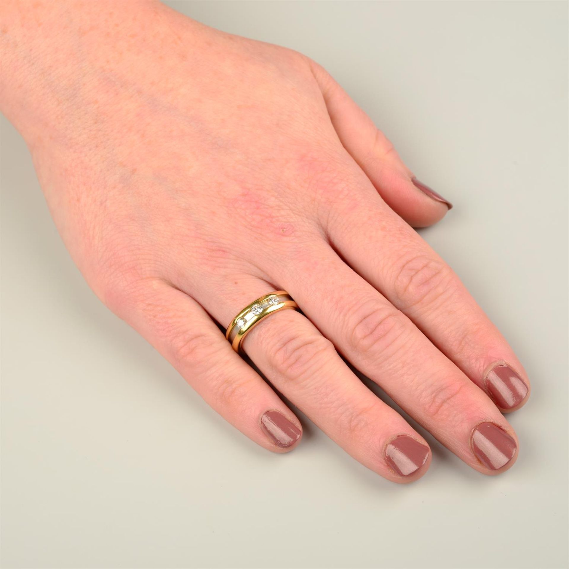 A bi-colour 18ct gold brilliant-cut diamond band ring, by Boodles. - Image 5 of 5