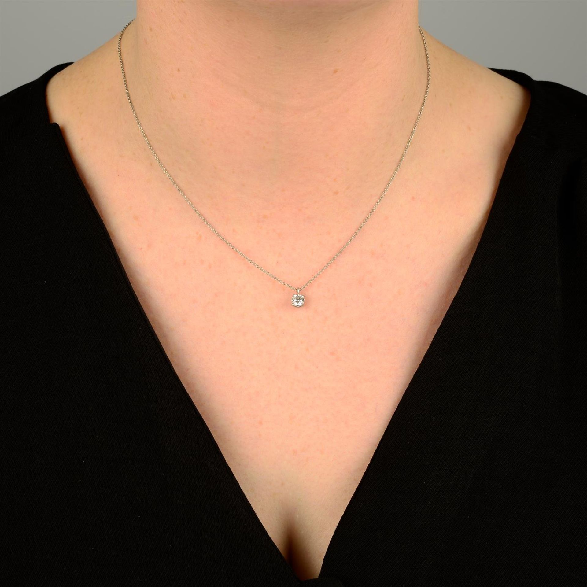 A platinum brilliant-cut diamond pendant, on chain, by Tiffany & Co. - Image 5 of 5