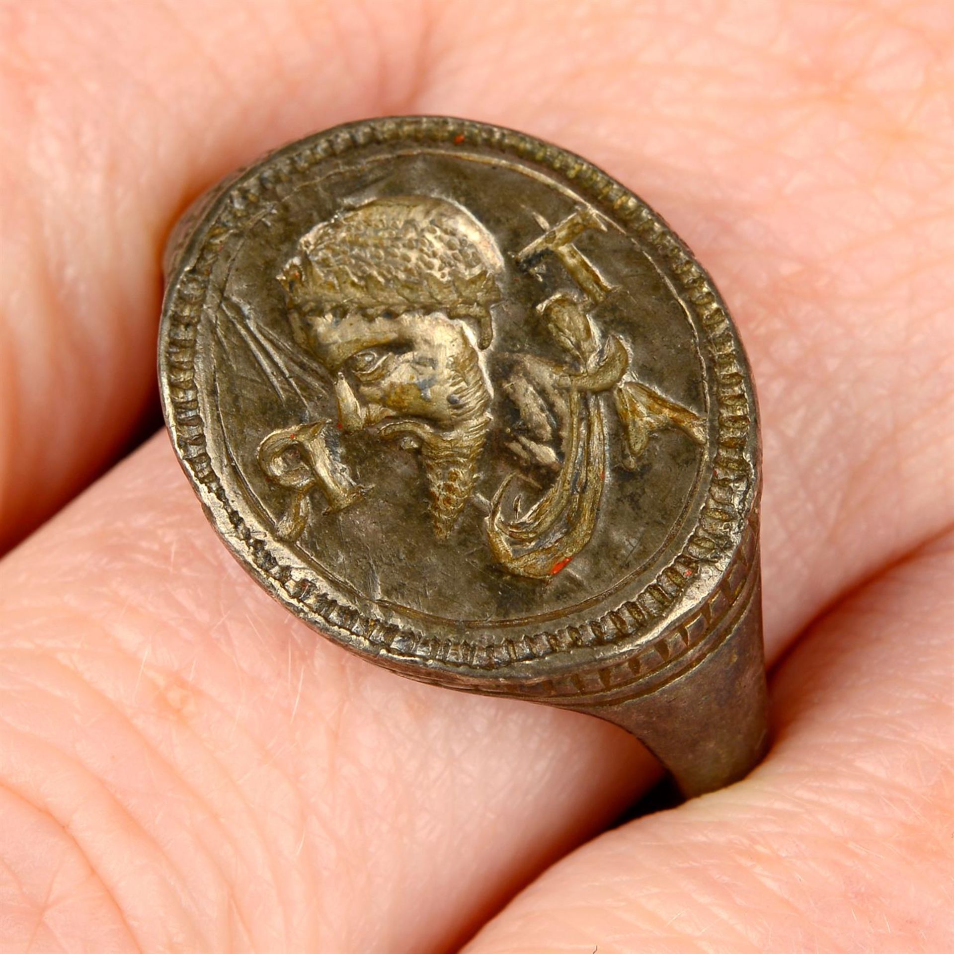 A late to post Medieval silver intaglio signet ring, depicting a bearded gentleman,