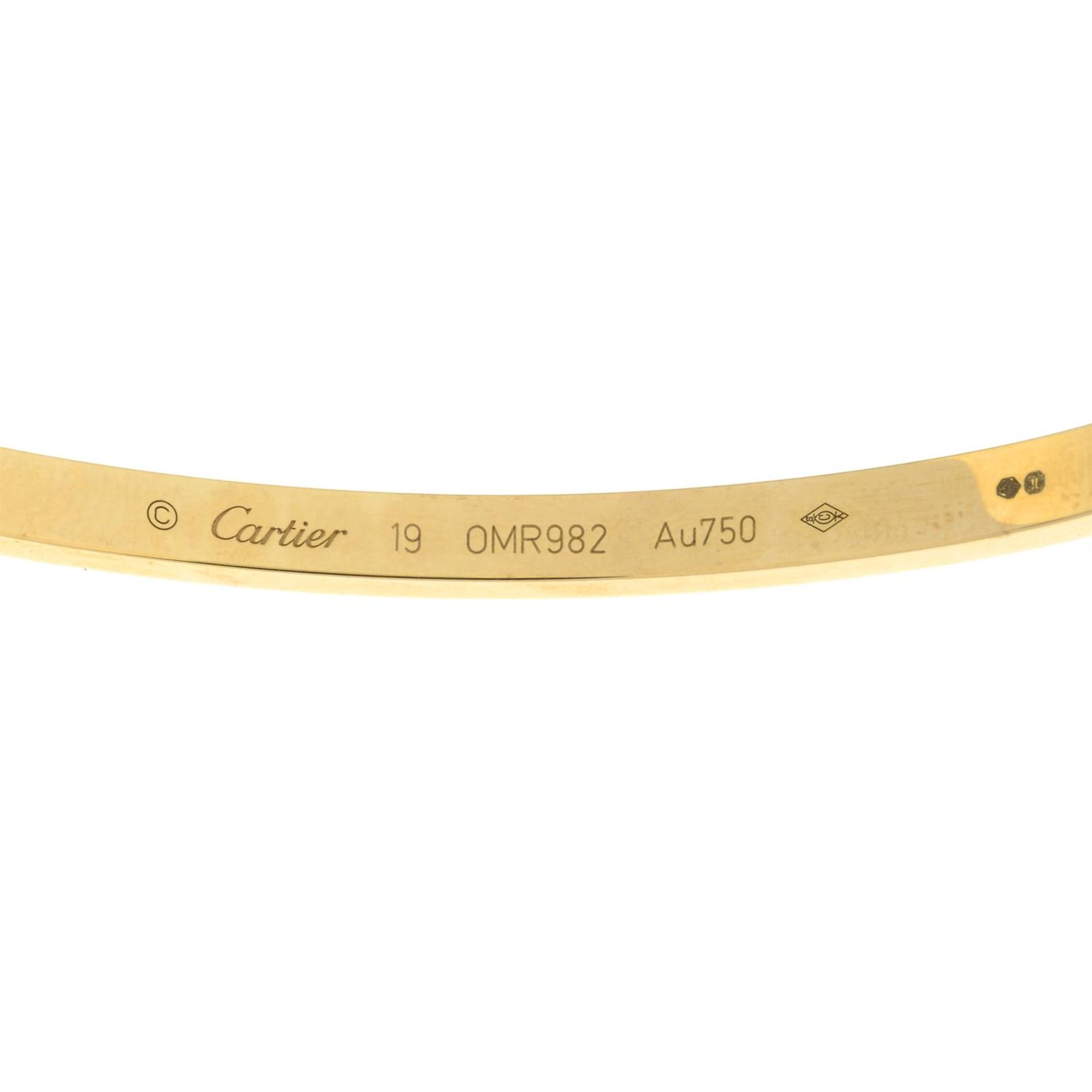 An 18ct gold 'Love' bangle, by Cartier. - Image 3 of 4