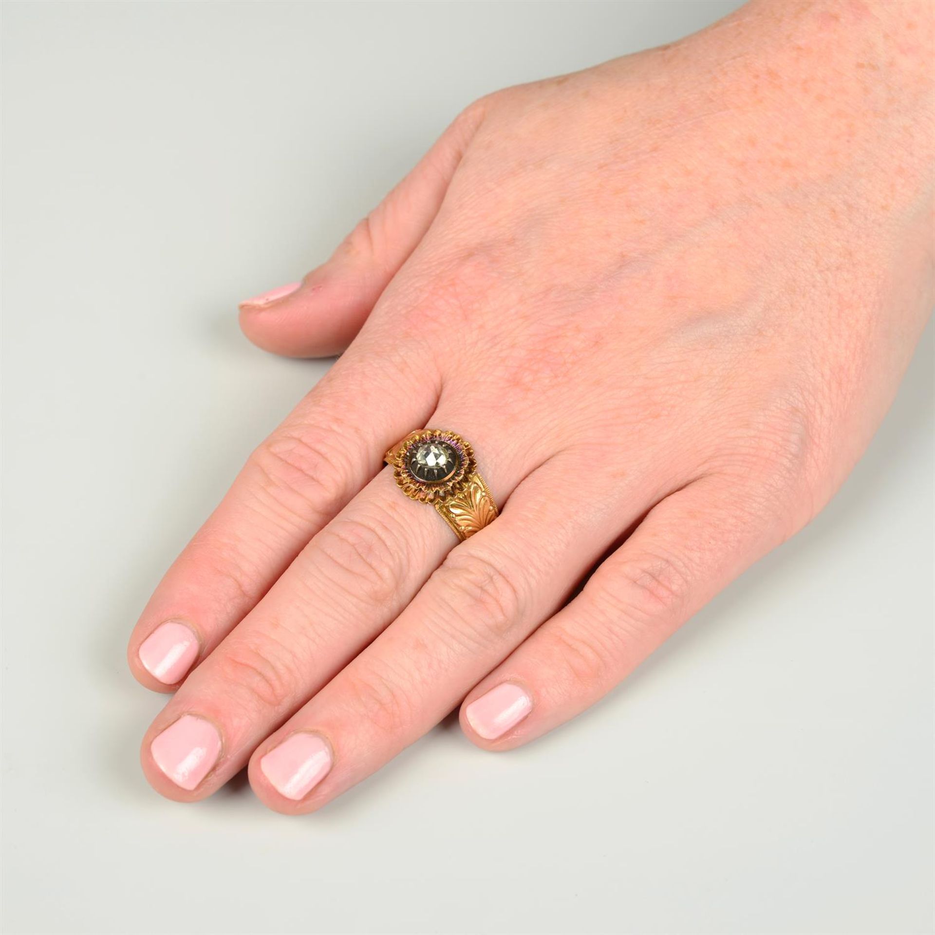 A 19th century 18ct gold rose-cut diamond floral ring, with foliate tapered band. - Image 5 of 5