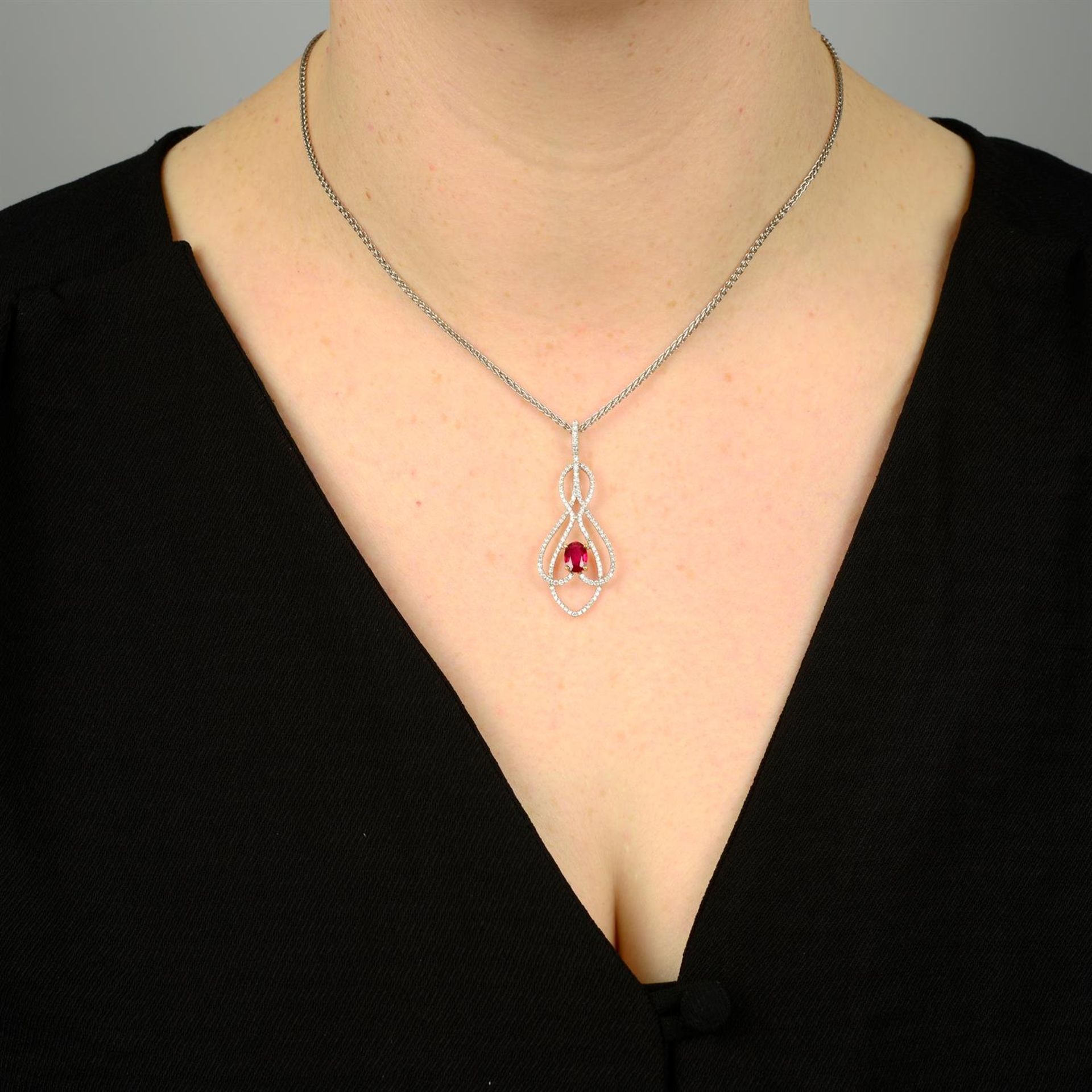 An 18ct gold ruby and diamond pendant, with chain. - Image 5 of 5