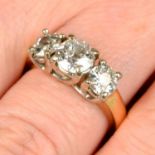 An old-cut diamond three-stone ring.