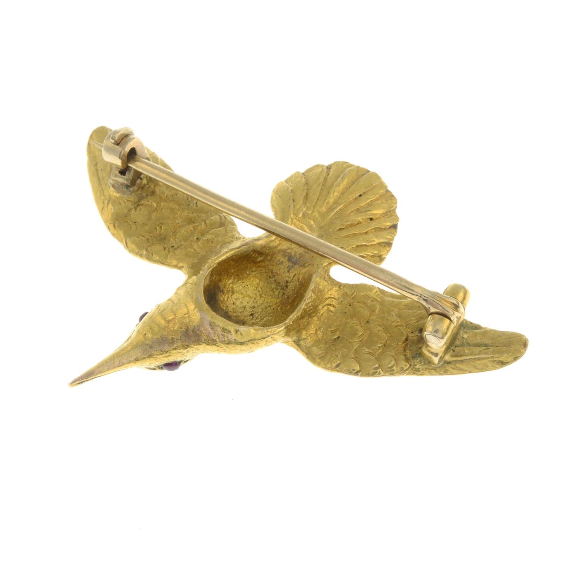 An early 20th century gold bird brooch, possibly a hummingbird, with ruby eyes. - Image 3 of 4
