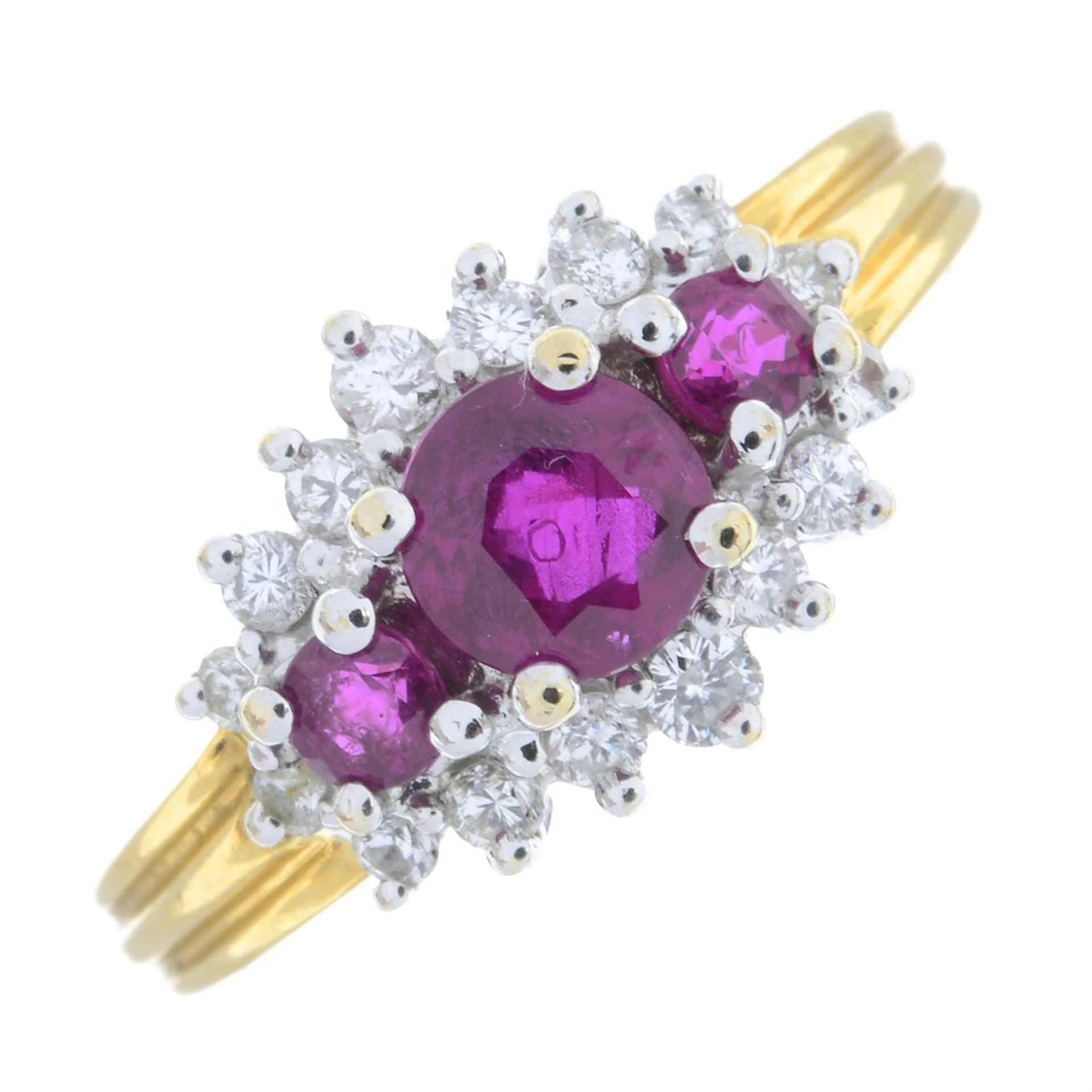 An 18ct gold graduated ruby three-stone ring, with brilliant-cut diamond surround. - Image 2 of 5