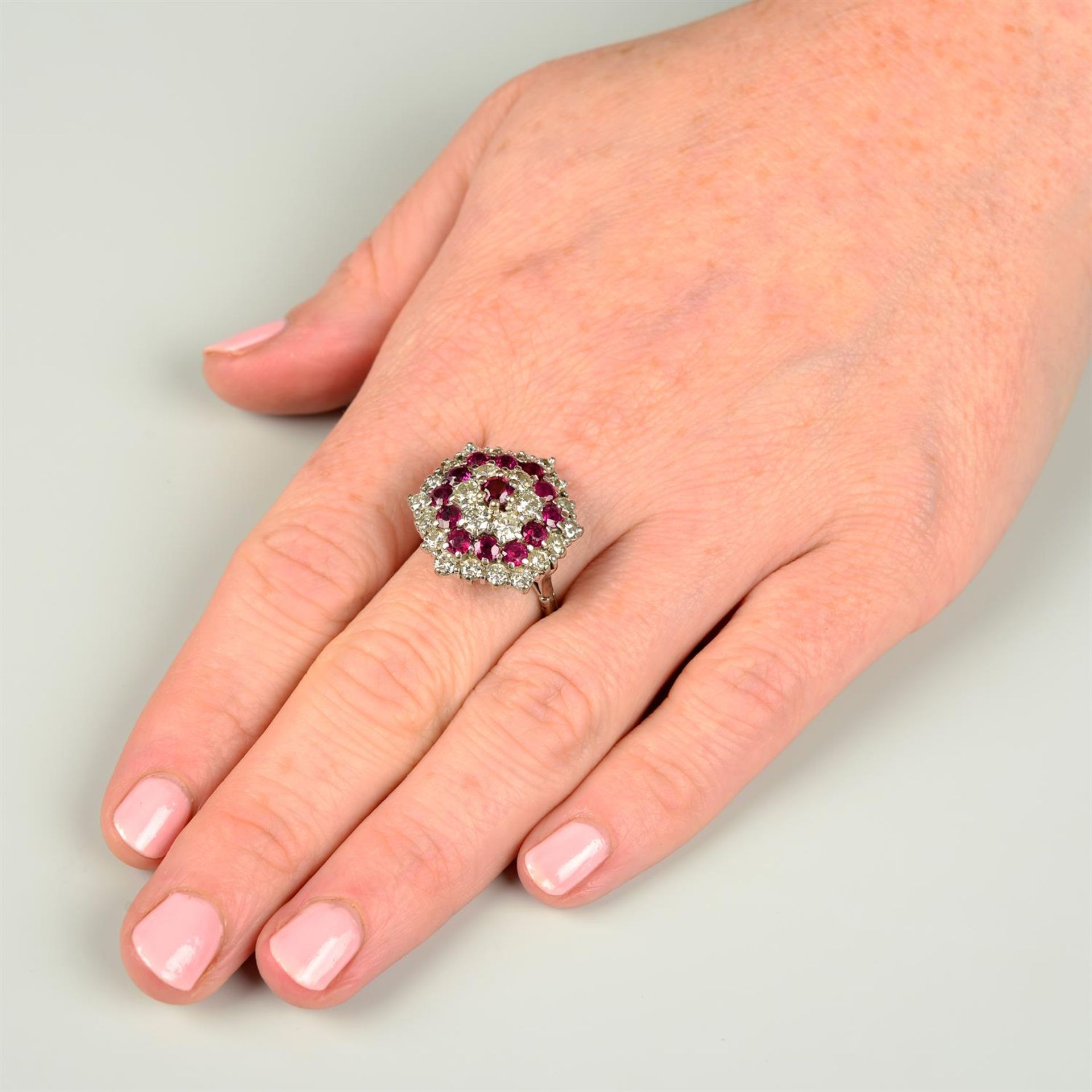 A brilliant-cut diamond and ruby cluster ring. - Image 6 of 6