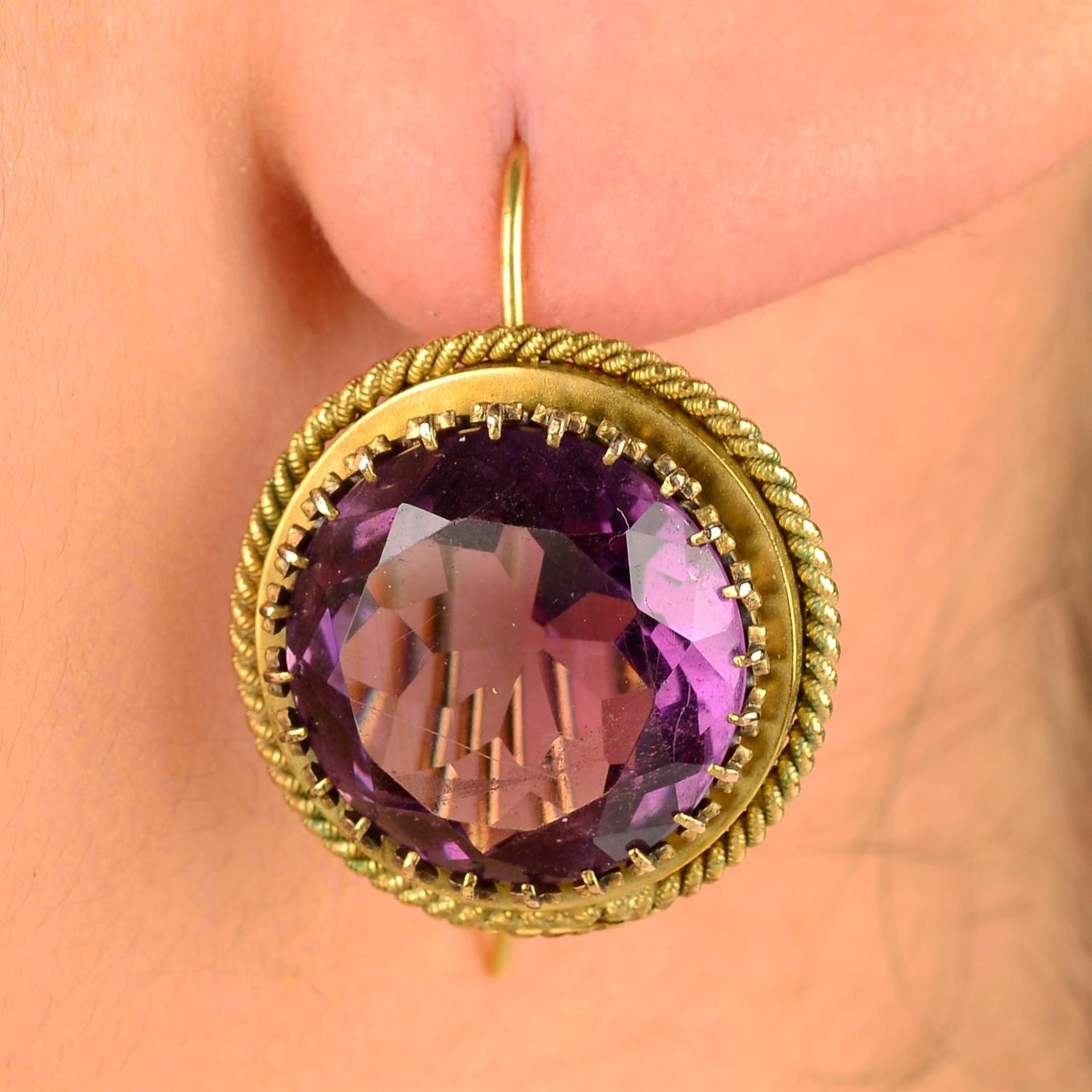 A pair of late 19th century gold amethyst earrings.