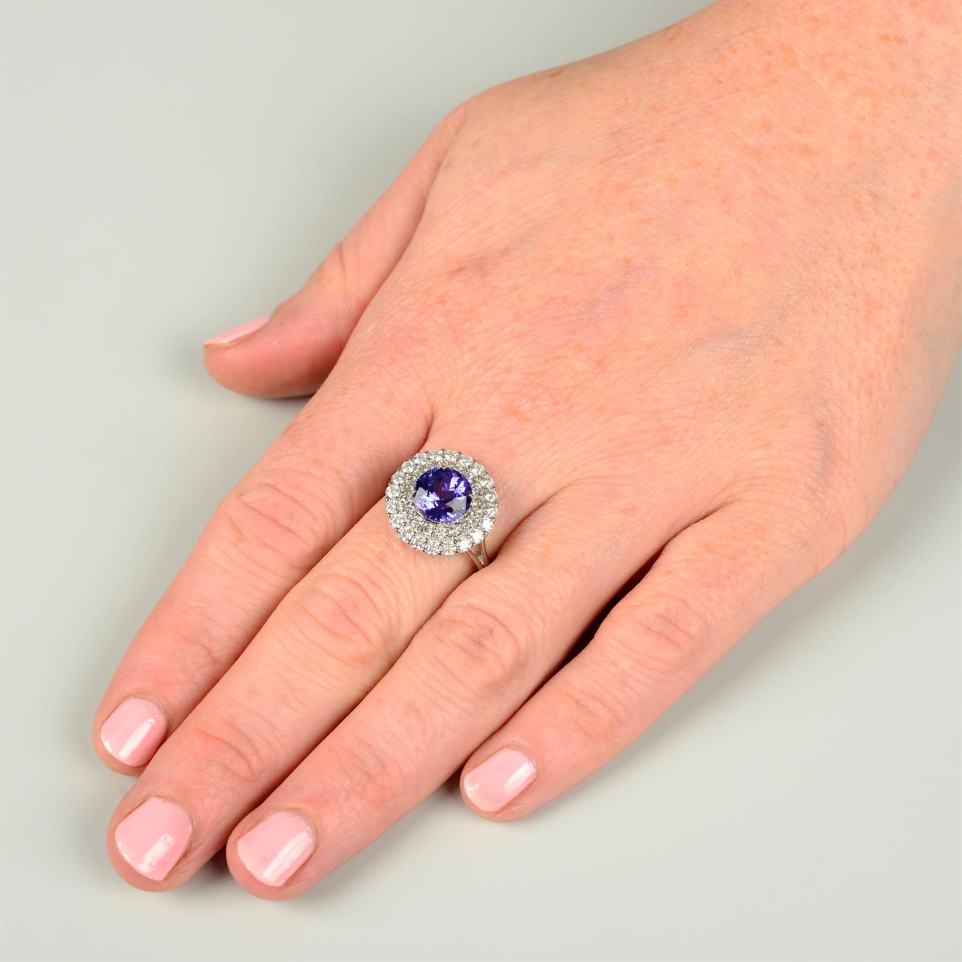 A tanzanite and diamond cluster ring. - Image 5 of 5