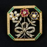 A vari-cut diamond, seed pearl, ruby, sapphire and emerald floral brooch.