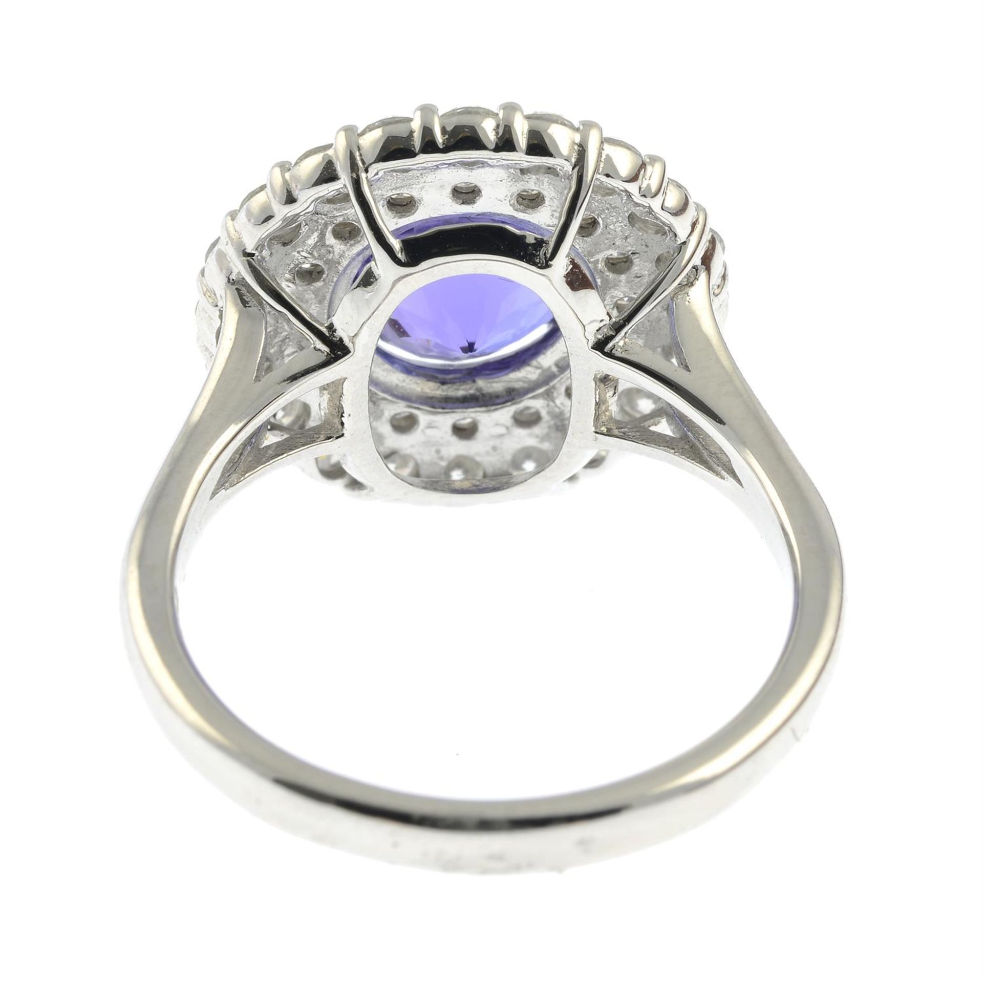 A tanzanite and diamond cluster ring. - Image 4 of 5