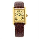 CARTIER - a gold plated silver Must De Cartier Tank wrist watch, 22x22mm.