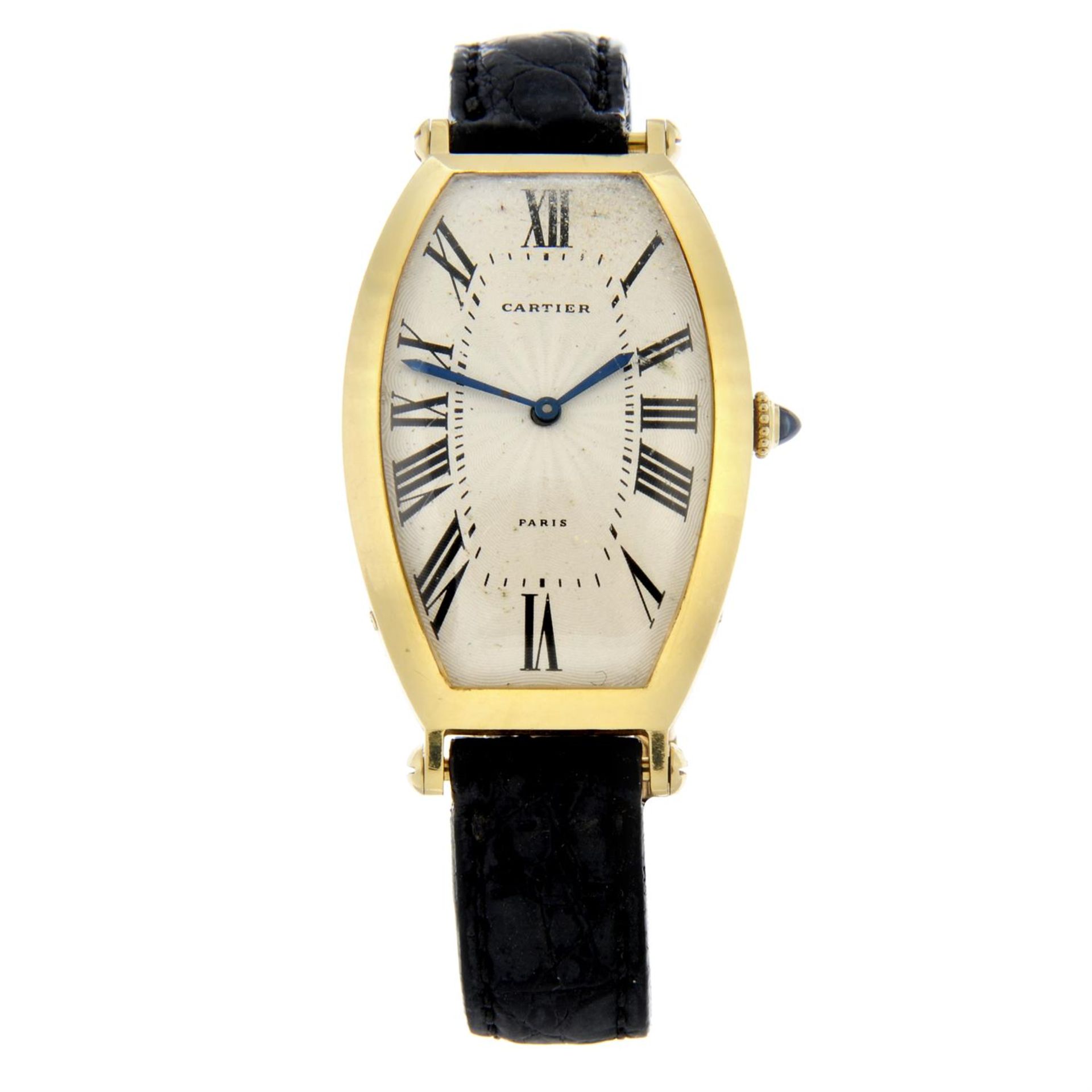 CARTIER - a yellow metal Tonneau wrist watch, 26x39mm.