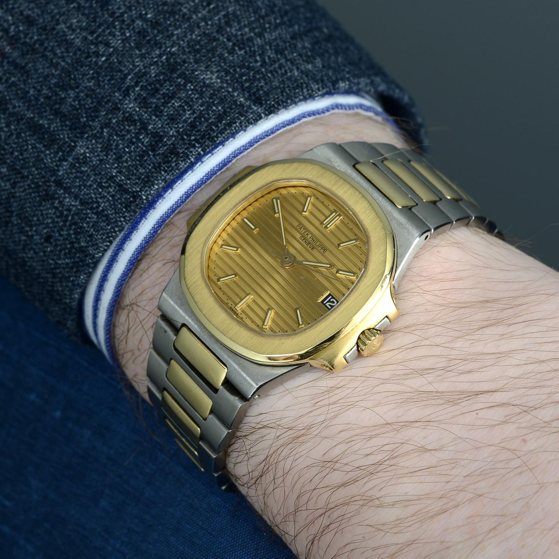 PATEK PHILIPPE - a bi-metal Nautilus bracelet watch, 35mm. - Image 7 of 7