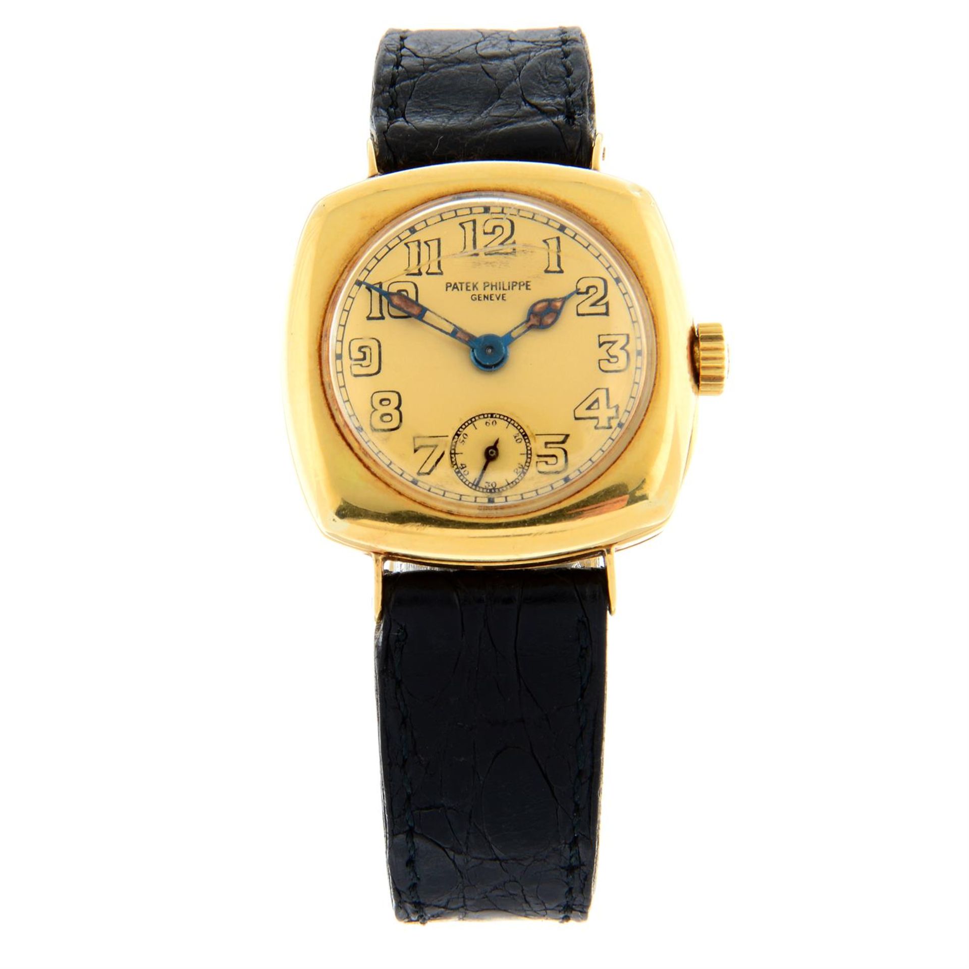 PATEK PHILLIPPE - a yellow metal Officer's wrist watch, 30x30mm.