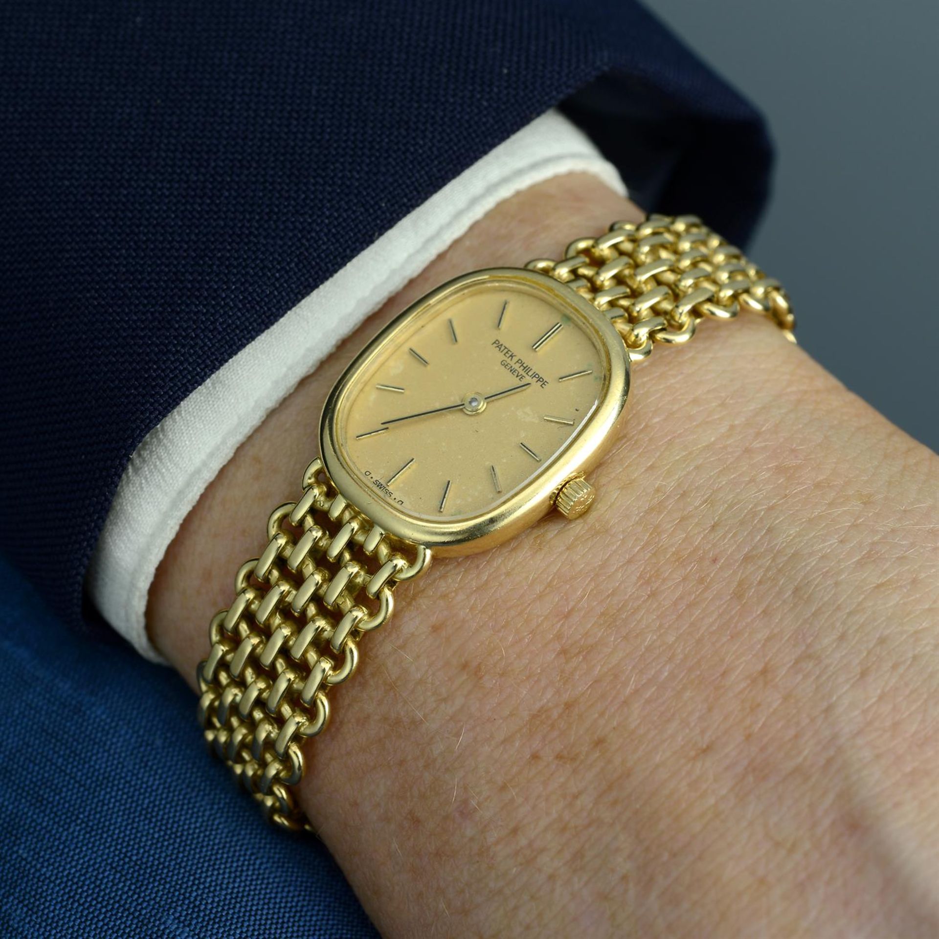 PATEK PHILIPPE - an 18ct yellow gold Ellipse bracelet watch, 20x24mm. - Image 5 of 5