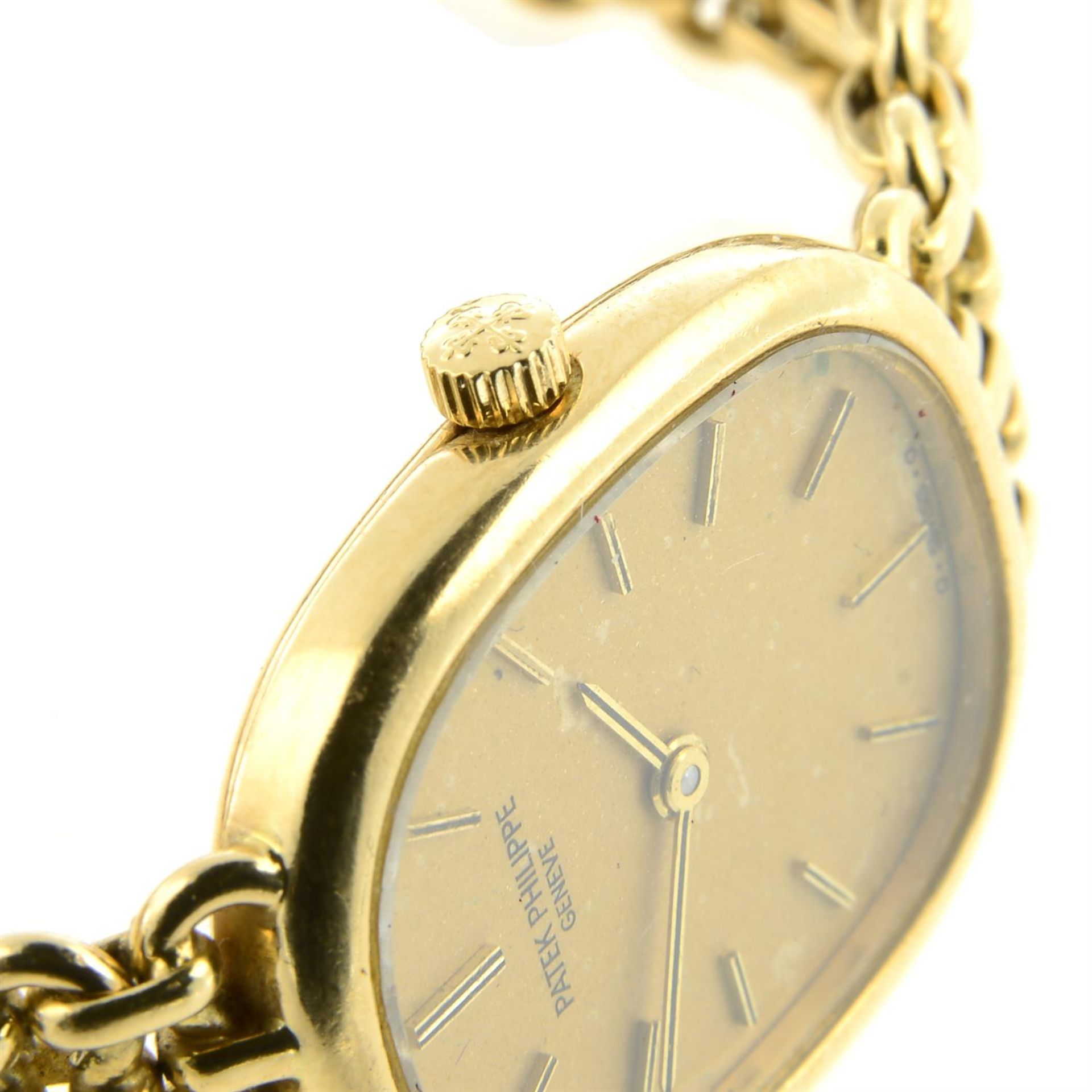 PATEK PHILIPPE - an 18ct yellow gold Ellipse bracelet watch, 20x24mm. - Image 4 of 5