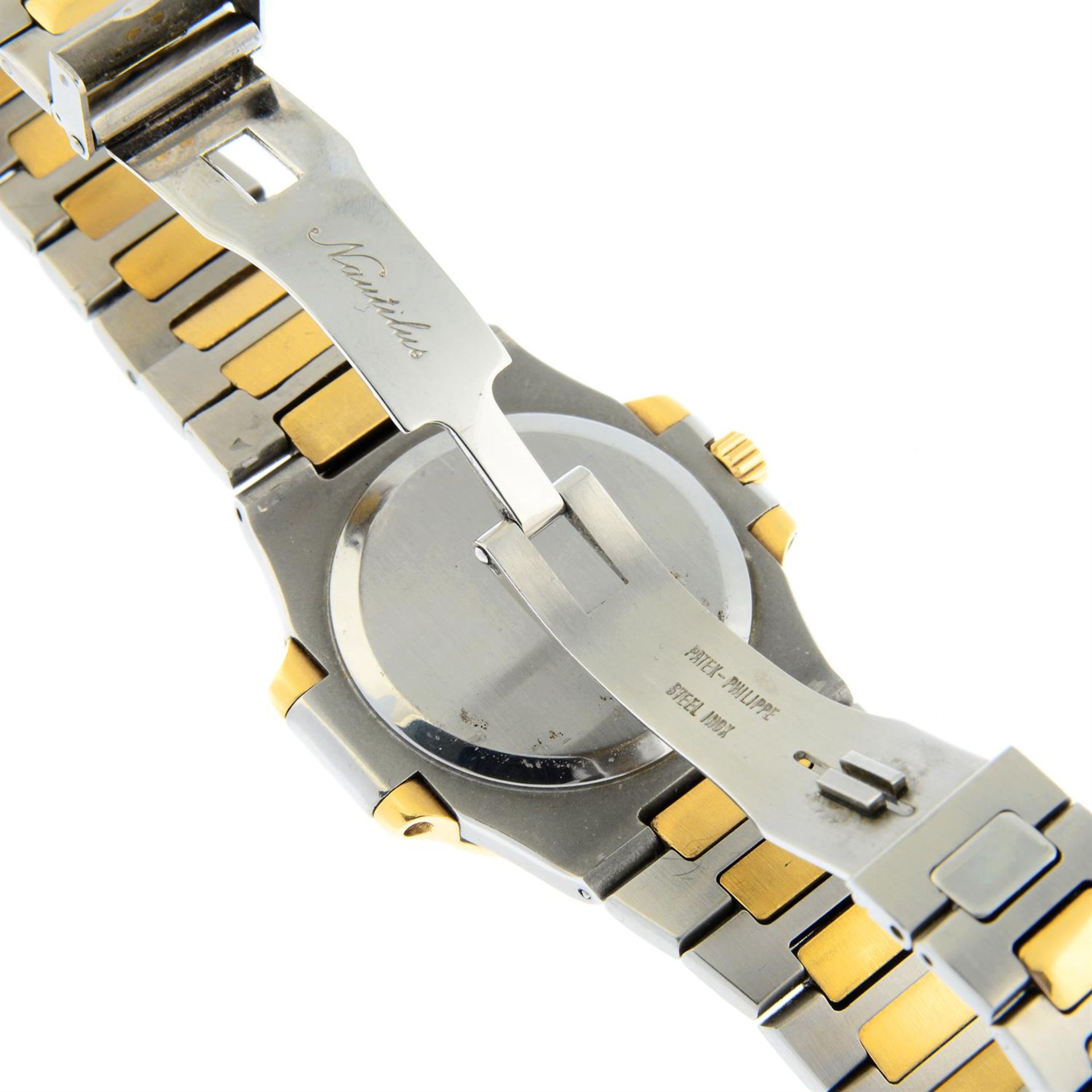 PATEK PHILIPPE - a bi-metal Nautilus bracelet watch, 35mm. - Image 6 of 7