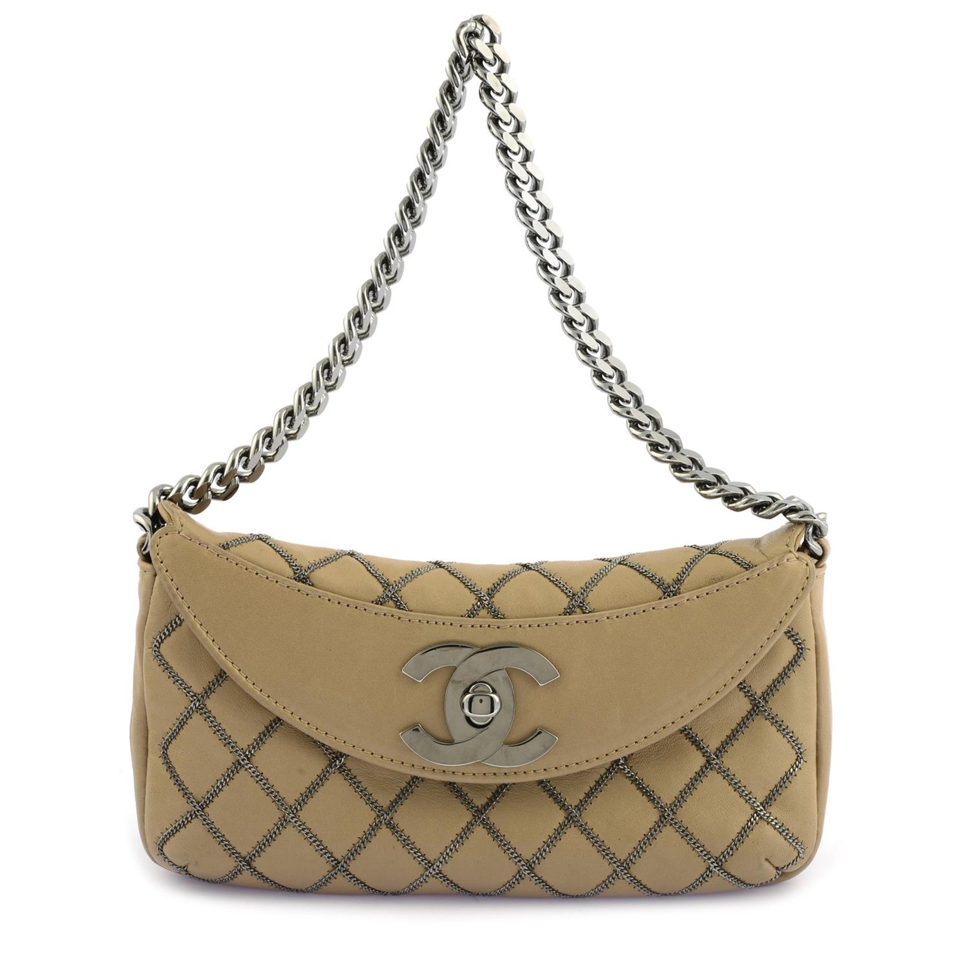 CHANEL - a beige leather chain stitch flap shoulder bag.