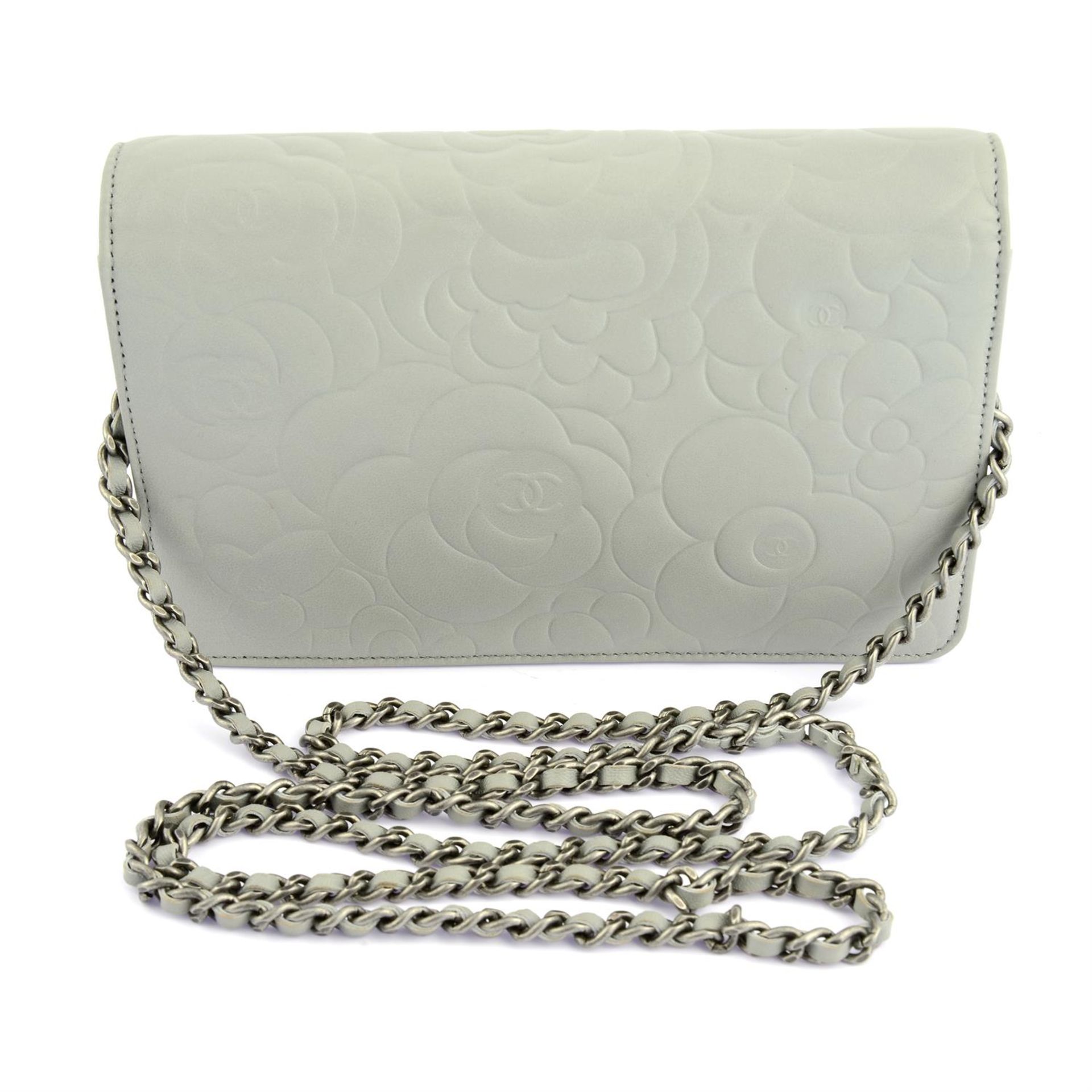 CHANEL - a light grey Camelia embossed leather wallet on chain. - Image 2 of 6