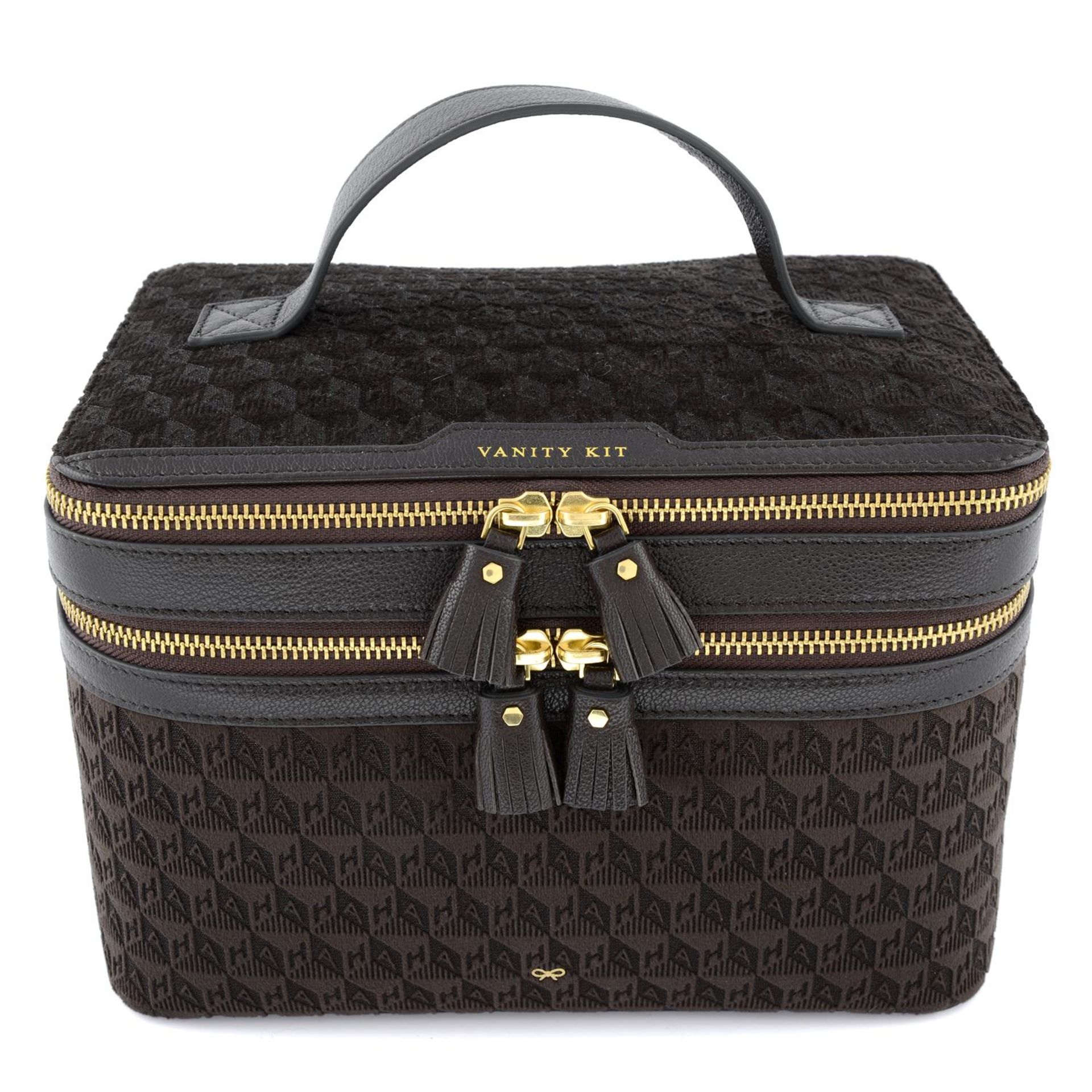 ANYA HINDMARCH - a chocolate brown velvet vanity case.