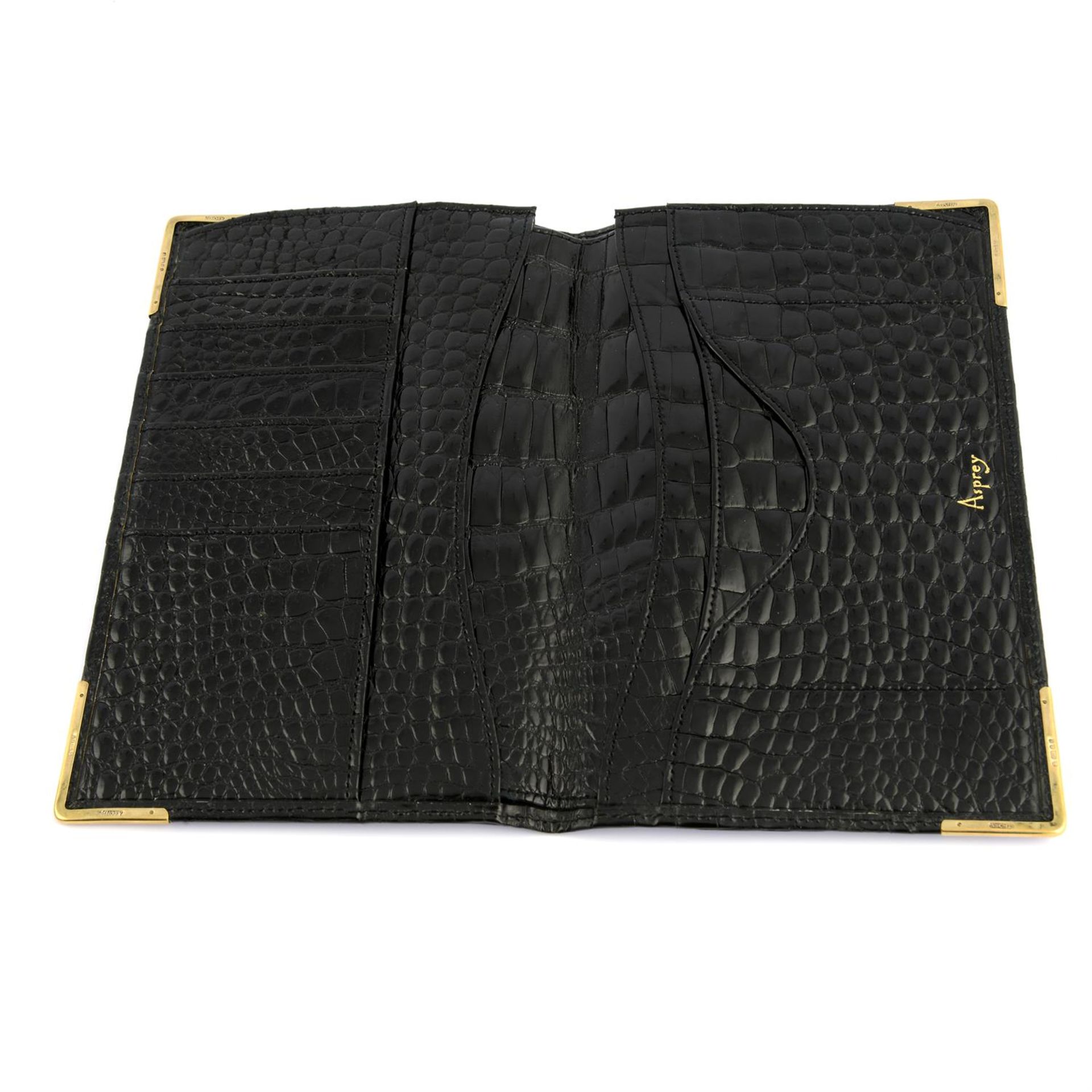 ASPREY - a black patent Crocodile leather wallet with 9ct gold mounted edges. - Bild 3 aus 4