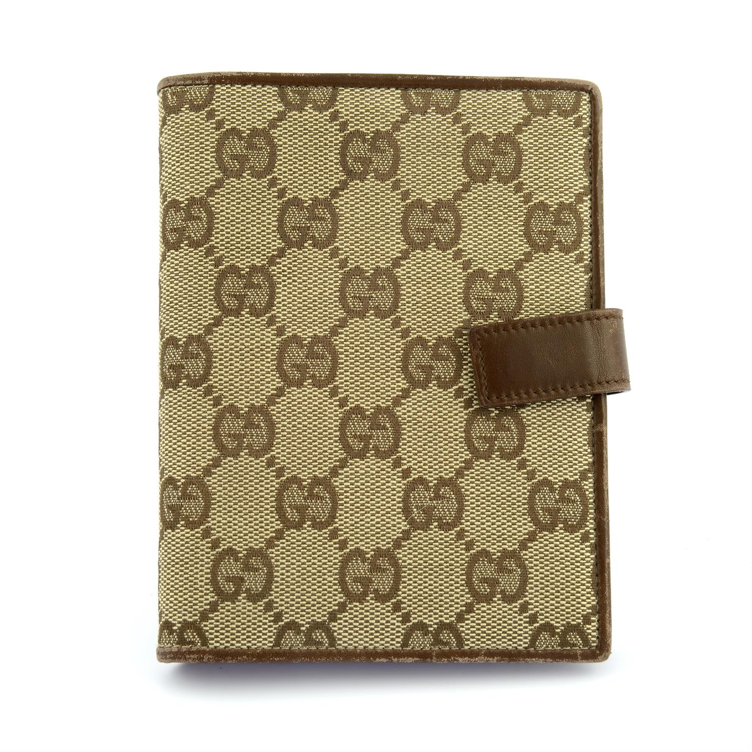 GUCCI - a Guccissima address book and note pad.