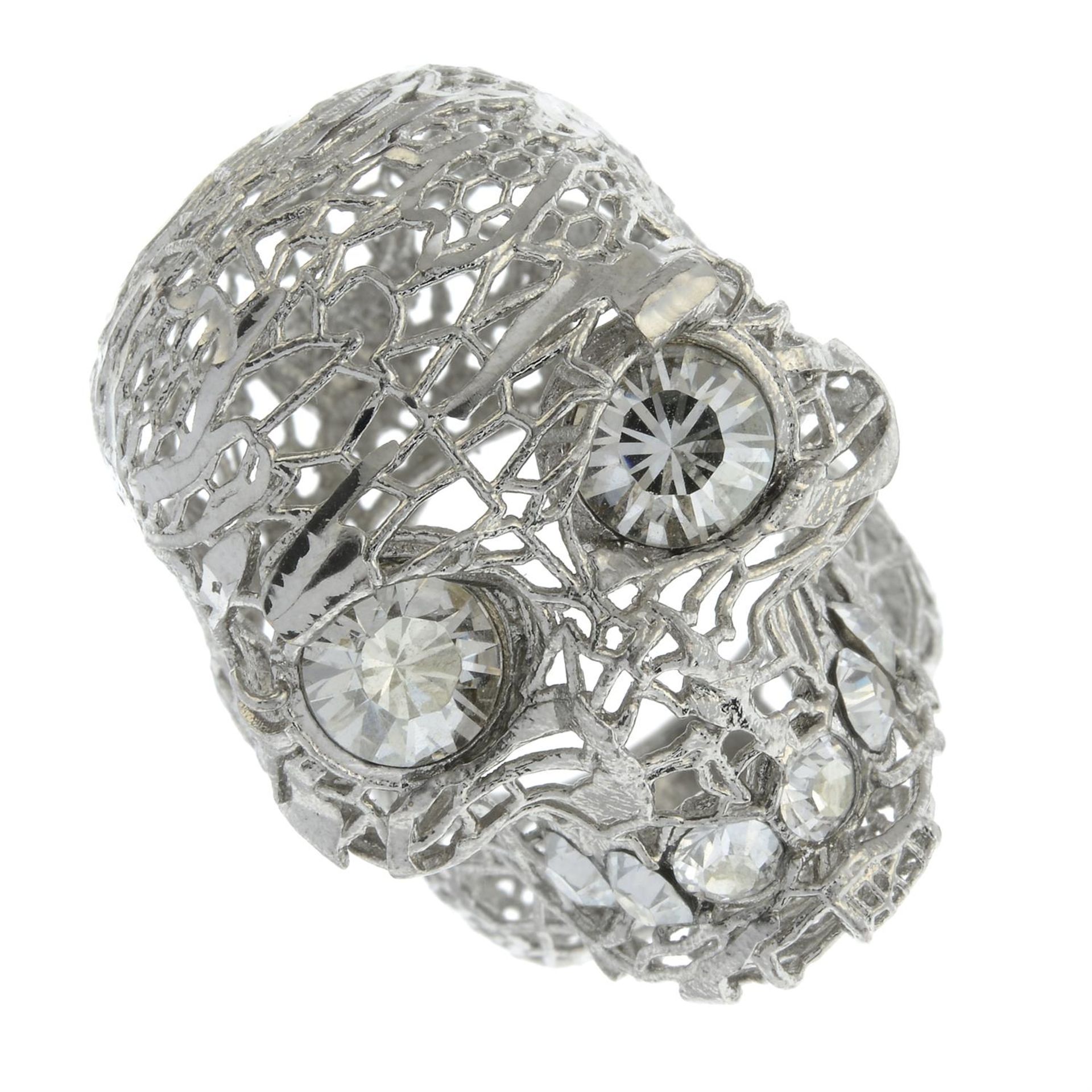 ALEXANDER MCQUEEN - a filigree skull ring.