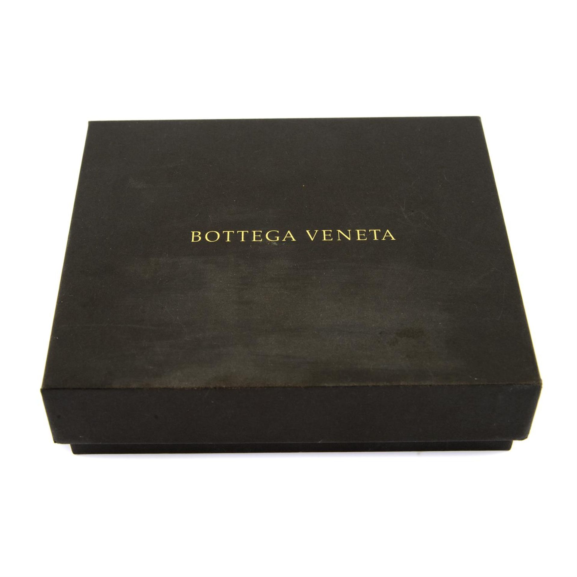 BOTTEGA VENETA - a burgundy leather card holder. - Image 3 of 3