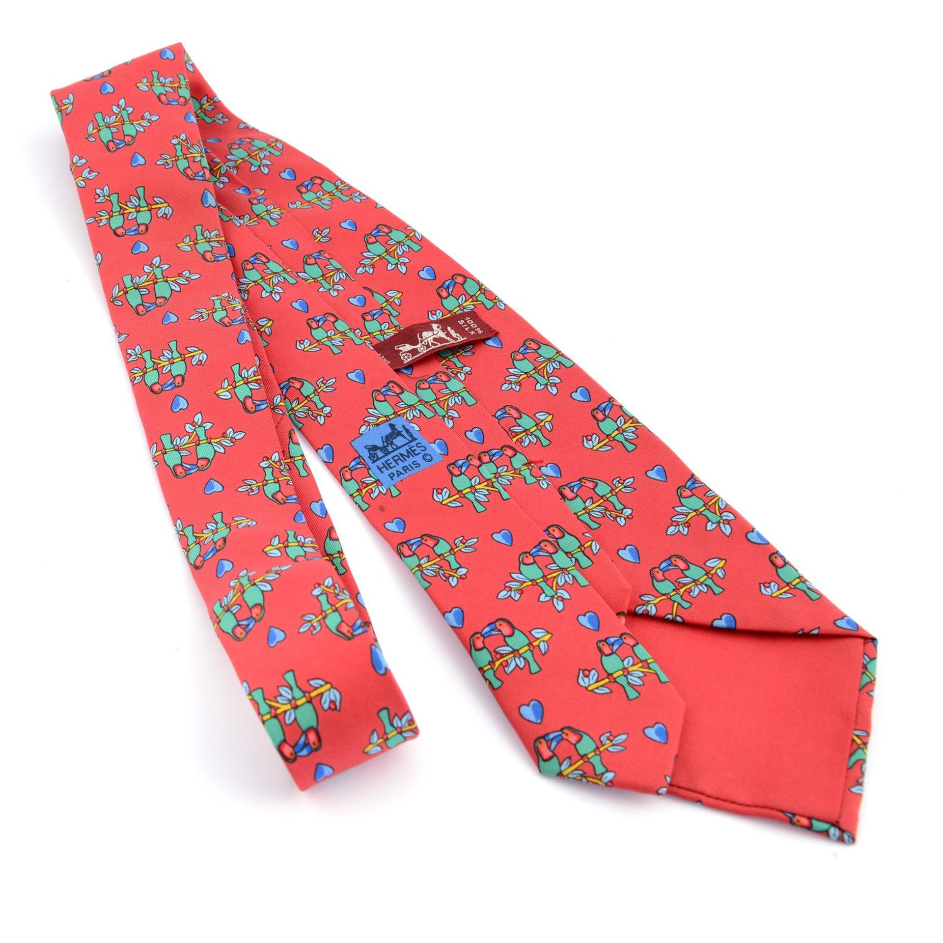 HERMÈS - a red Parrot print silk tie. - Image 2 of 2