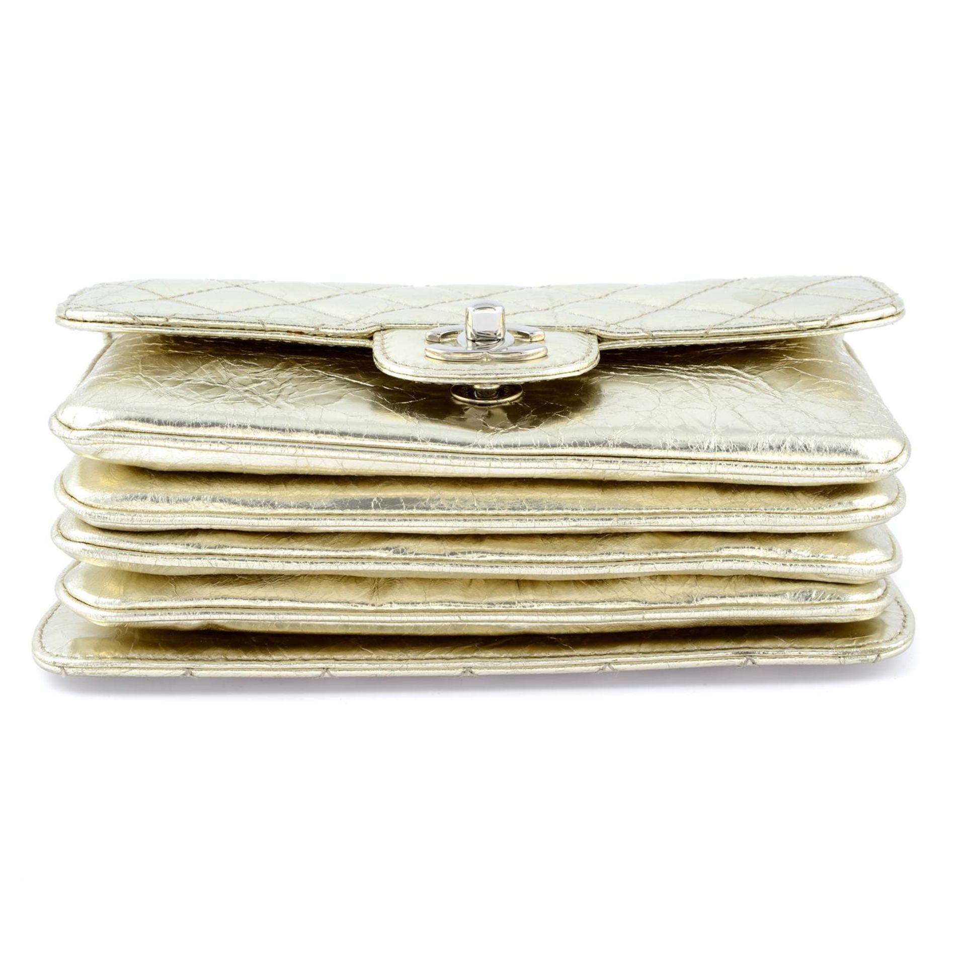 CHANEL - a metallic gold calfskin leather accordion flap handbag. - Image 4 of 4