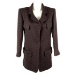 CHANEL - a brown tweed blazer.