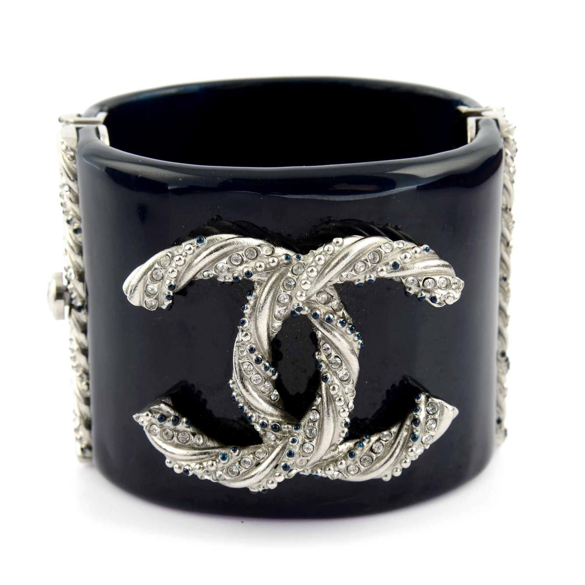 CHANEL - a navy resin cuff.