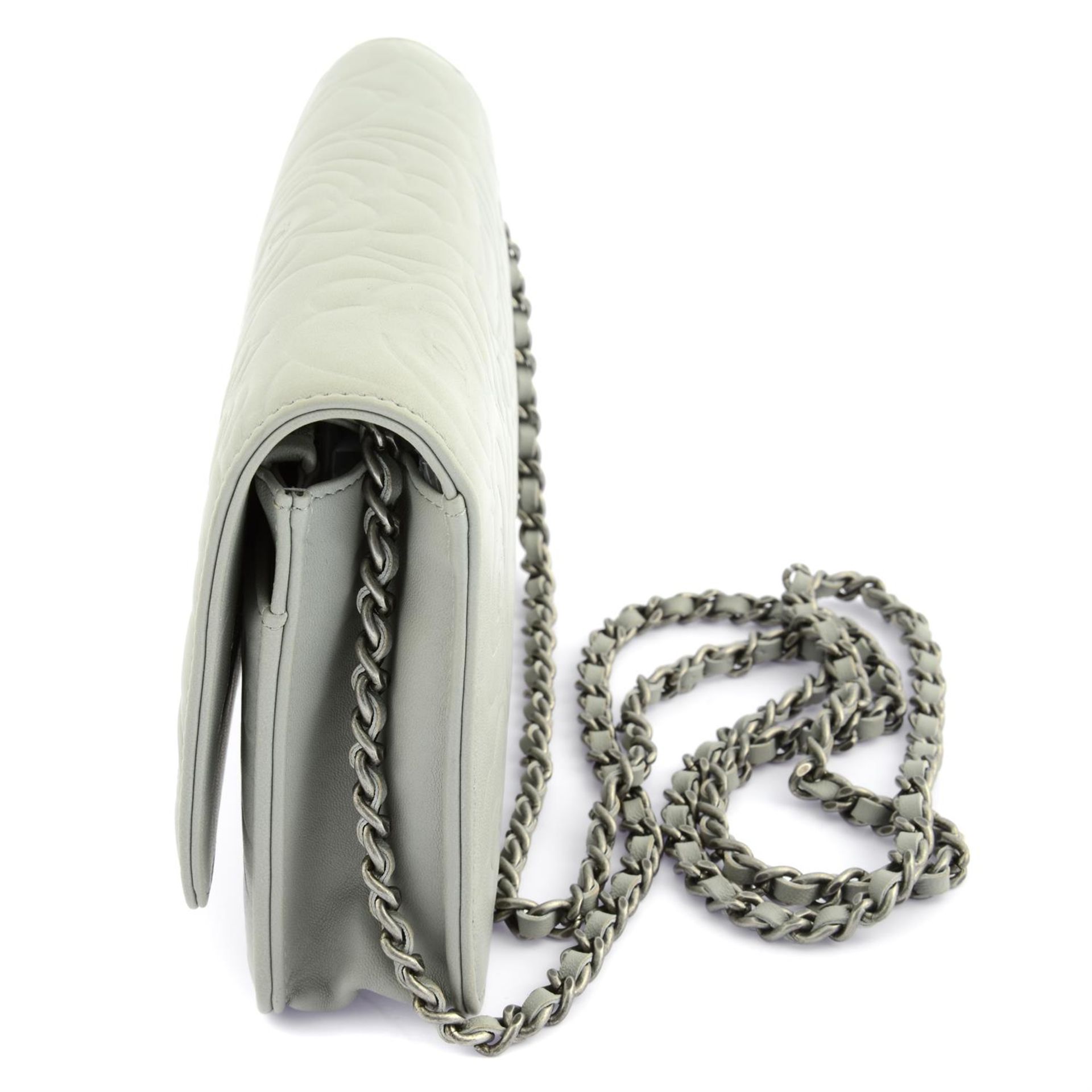 CHANEL - a light grey Camelia embossed leather wallet on chain. - Image 3 of 6