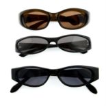 GUCCI - three pairs of sunglasses.