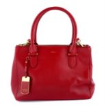 RALPH LAUREN - a red leather handbag.
