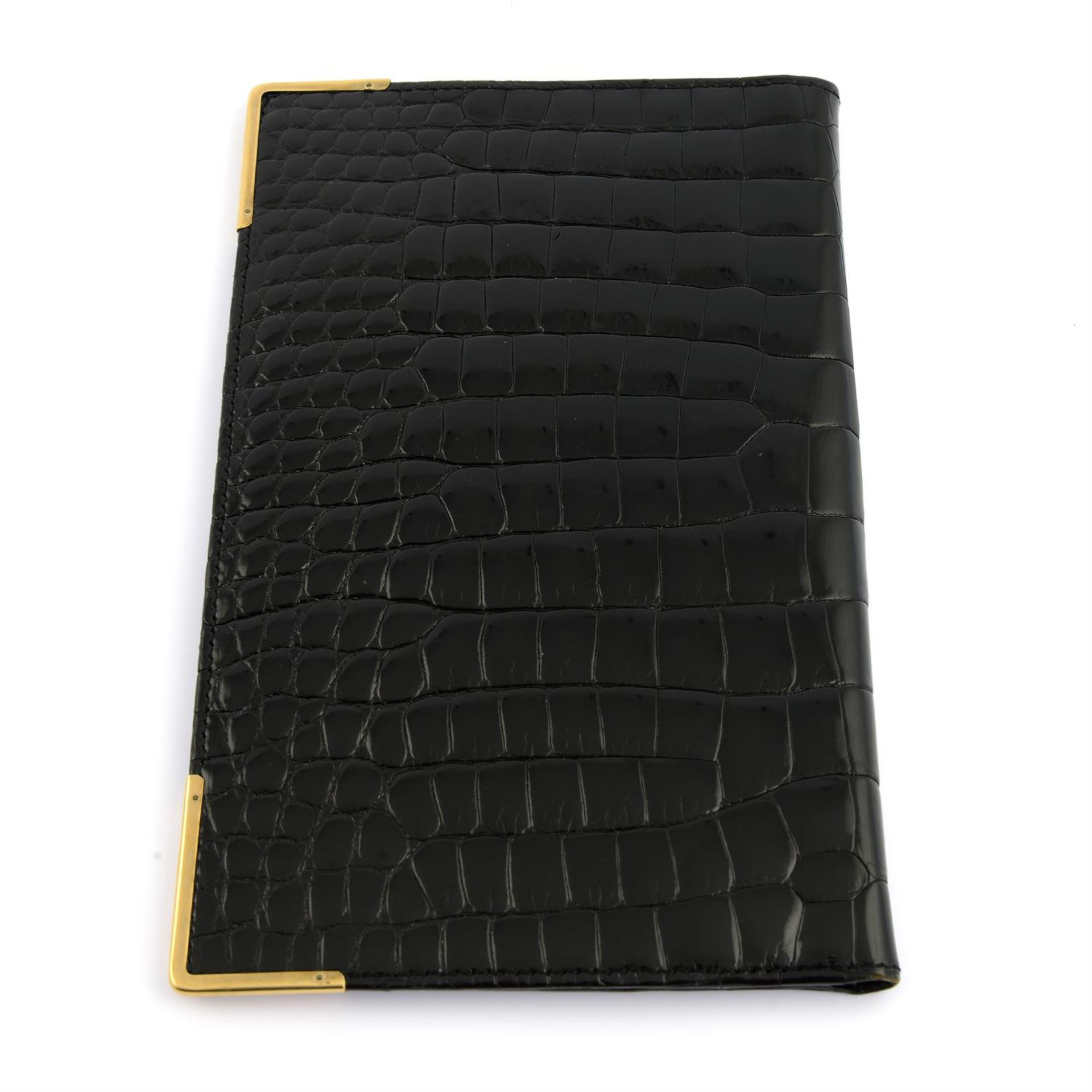 ASPREY - a black patent Crocodile leather wallet with 9ct gold mounted edges. - Bild 2 aus 4
