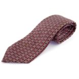 HERMÈS - a red chain print silk tie.