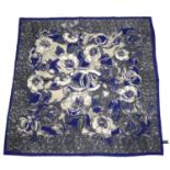 CHANEL - a dark blue Camellia print silk scarf.