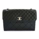 CHANEL - a black Calfskin leather Business flap bag.