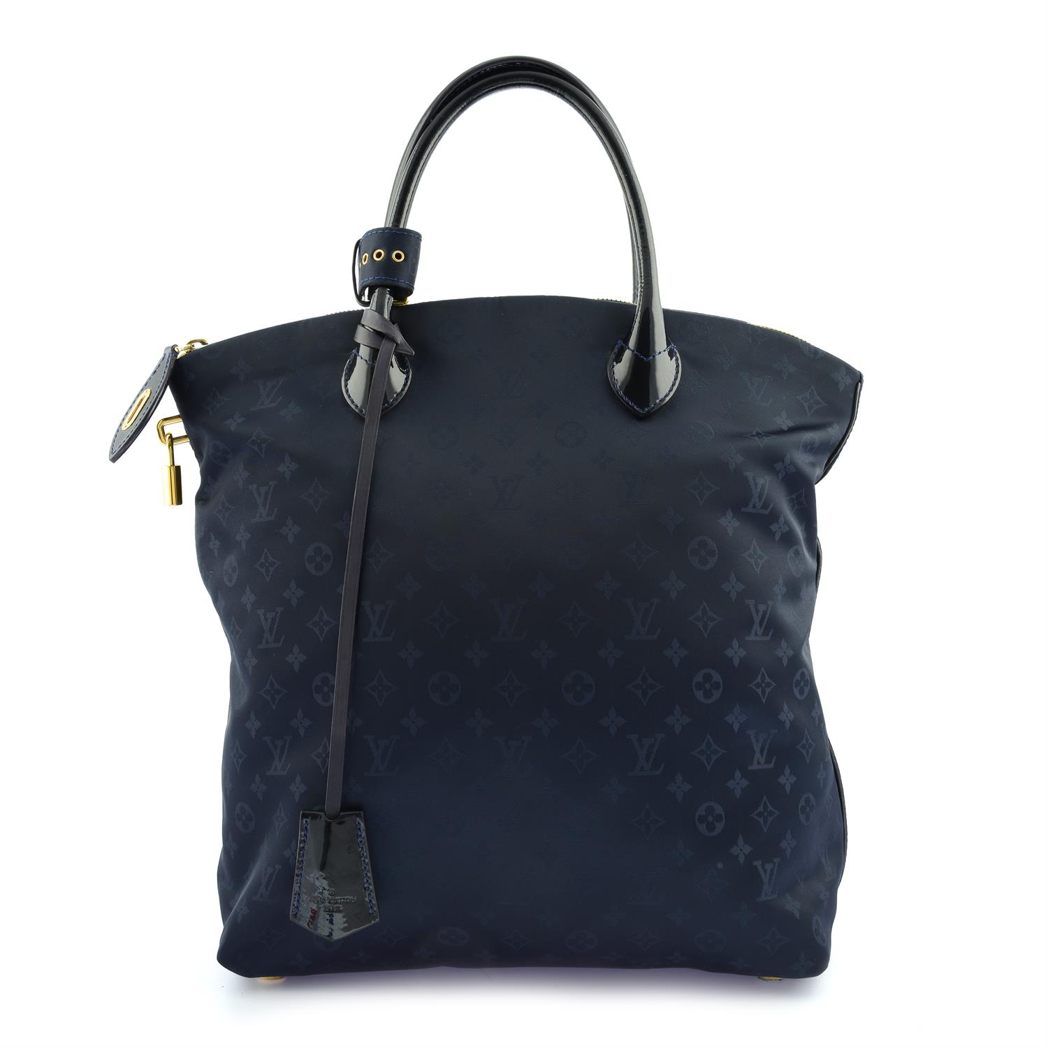 LOUIS VUITTON - a blue Monogram Desire Lockit MM.