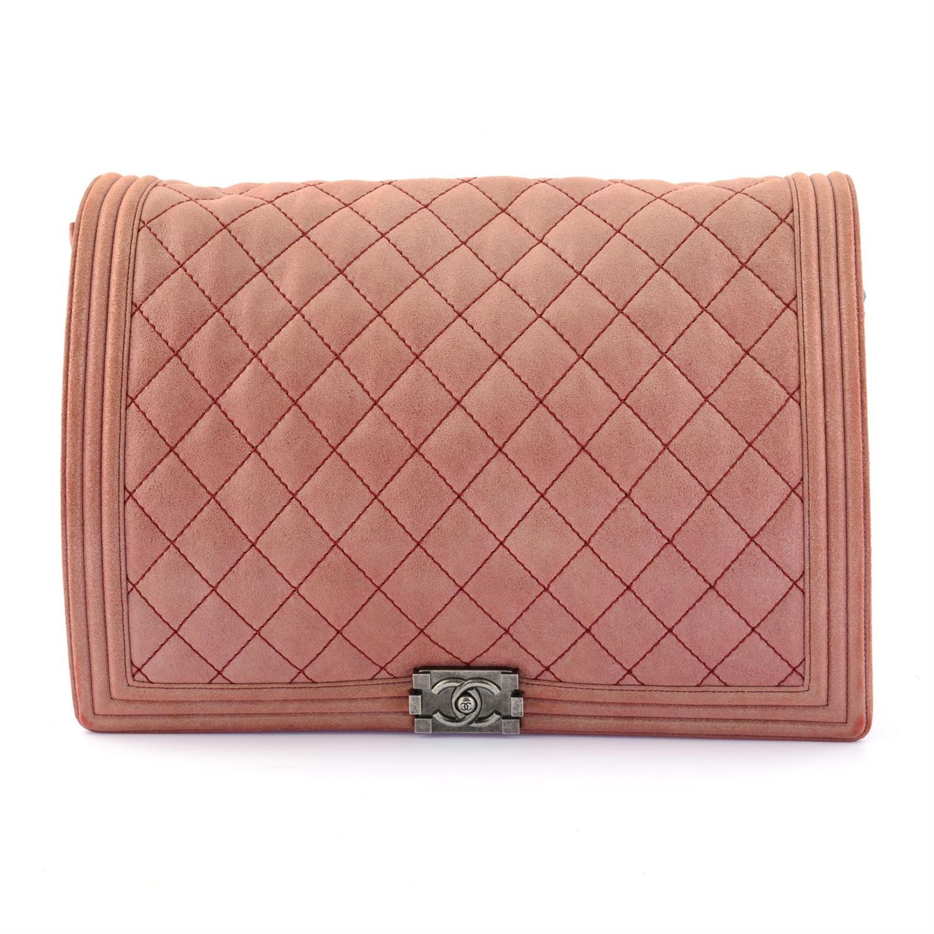 CHANEL - a pink goatskin leather XL Boy bag.