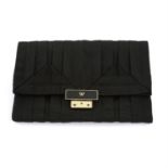 ANYA HINDMARCH - a black fabric clutch bag.