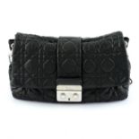 CHRISTIAN DIOR - a black leather Cannage New lock handbag.