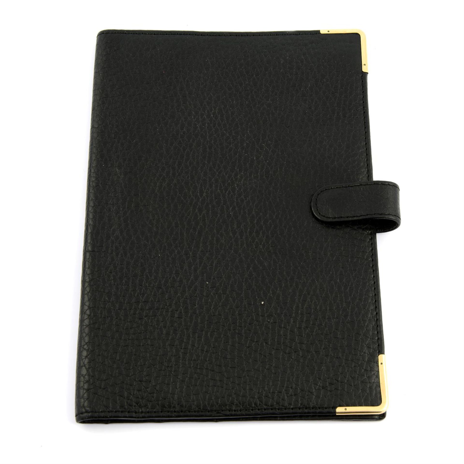 ASPREY - a black bull skin leather breast wallet.